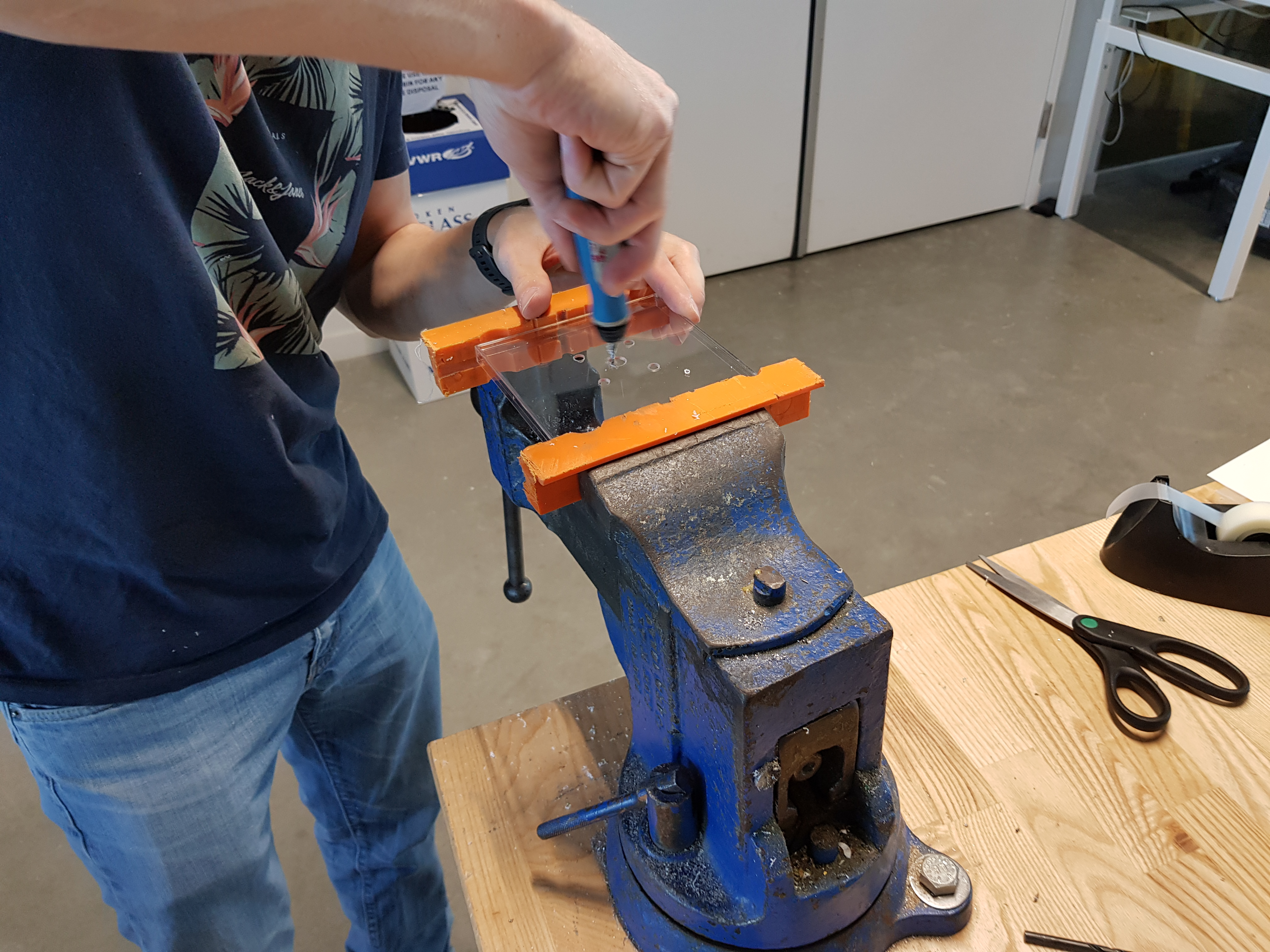 The first design of the frame was a drilled plastic box.
